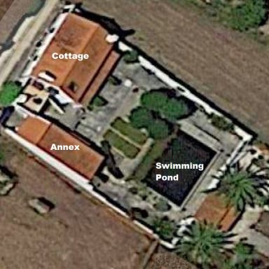 Aerial image of the property: Cottage, Annex and Swimming Pond.